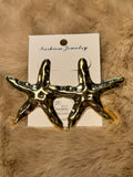Aretes maxi estrella de mar martillada Dorado