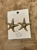 Aretes elegantes en forma de estrella de mar dorado
